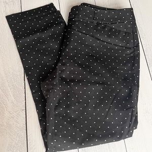 Black pants with white polka dots